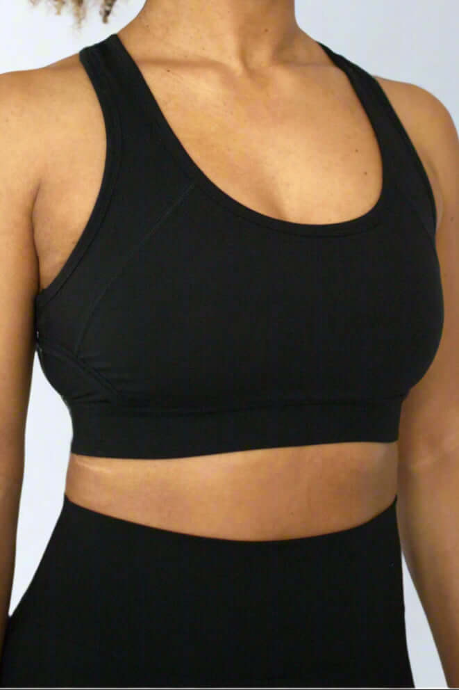 Black sports bra paired with leggings showing seam details