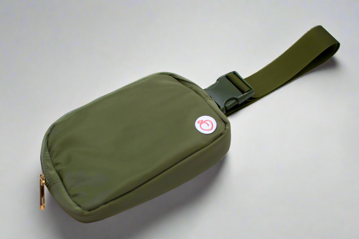 Angled view of olive crossbody bag
