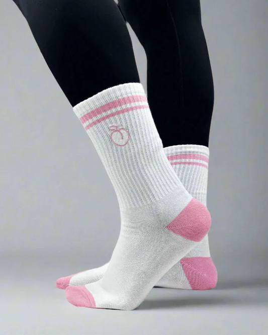 model wearing pink and white striped crew socks