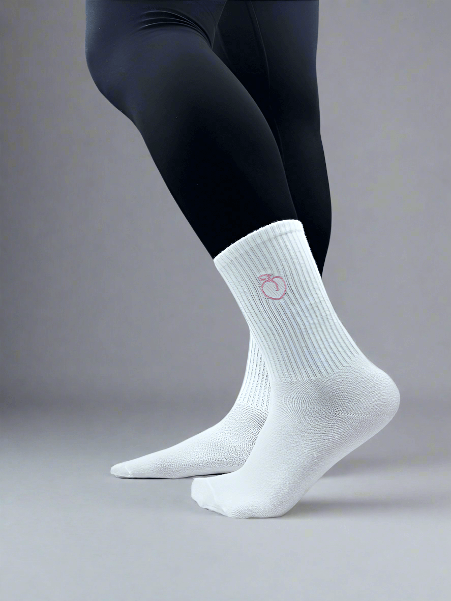 White socks with embroidered peach logo