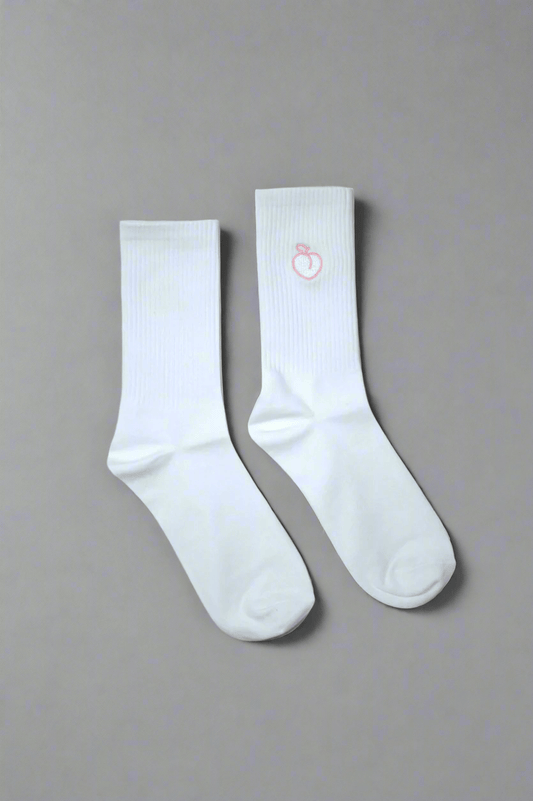 White crew socks with embroidered peach logo