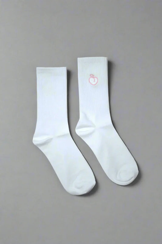 White crew socks with embroidered peach logo