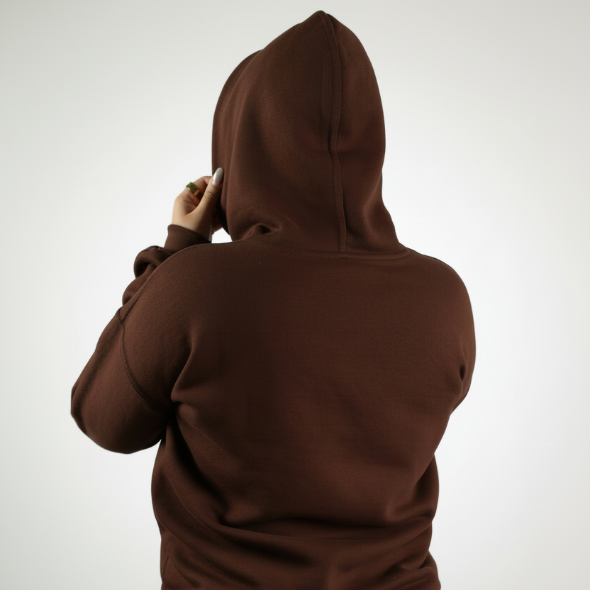 Brown hoodie and pants set on a white background