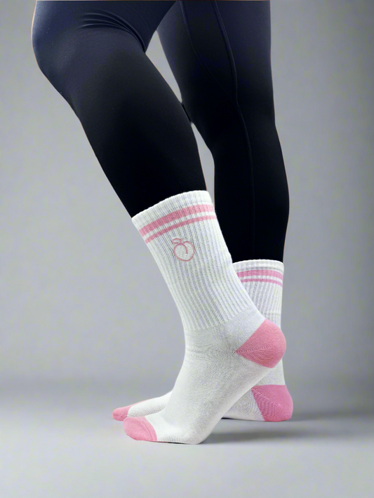 model wearing pink and white striped crew socks